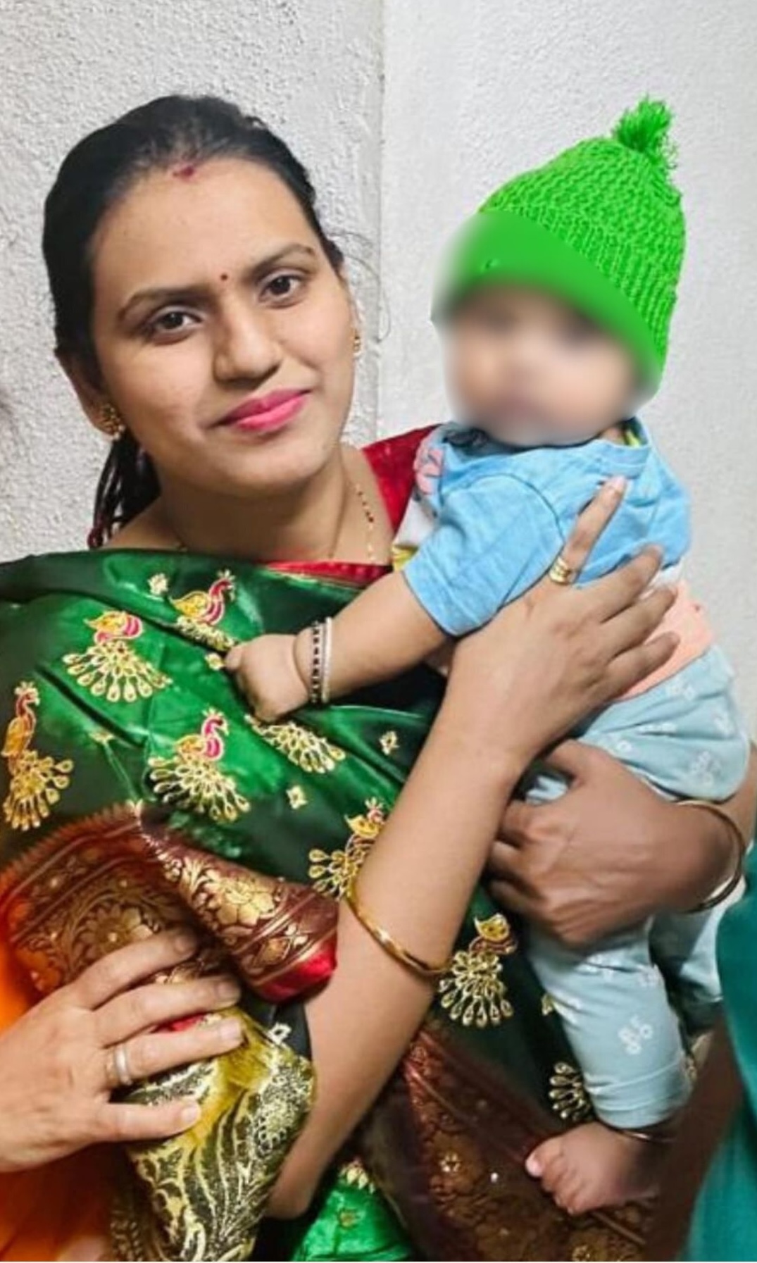 Flow 108 client with her baby